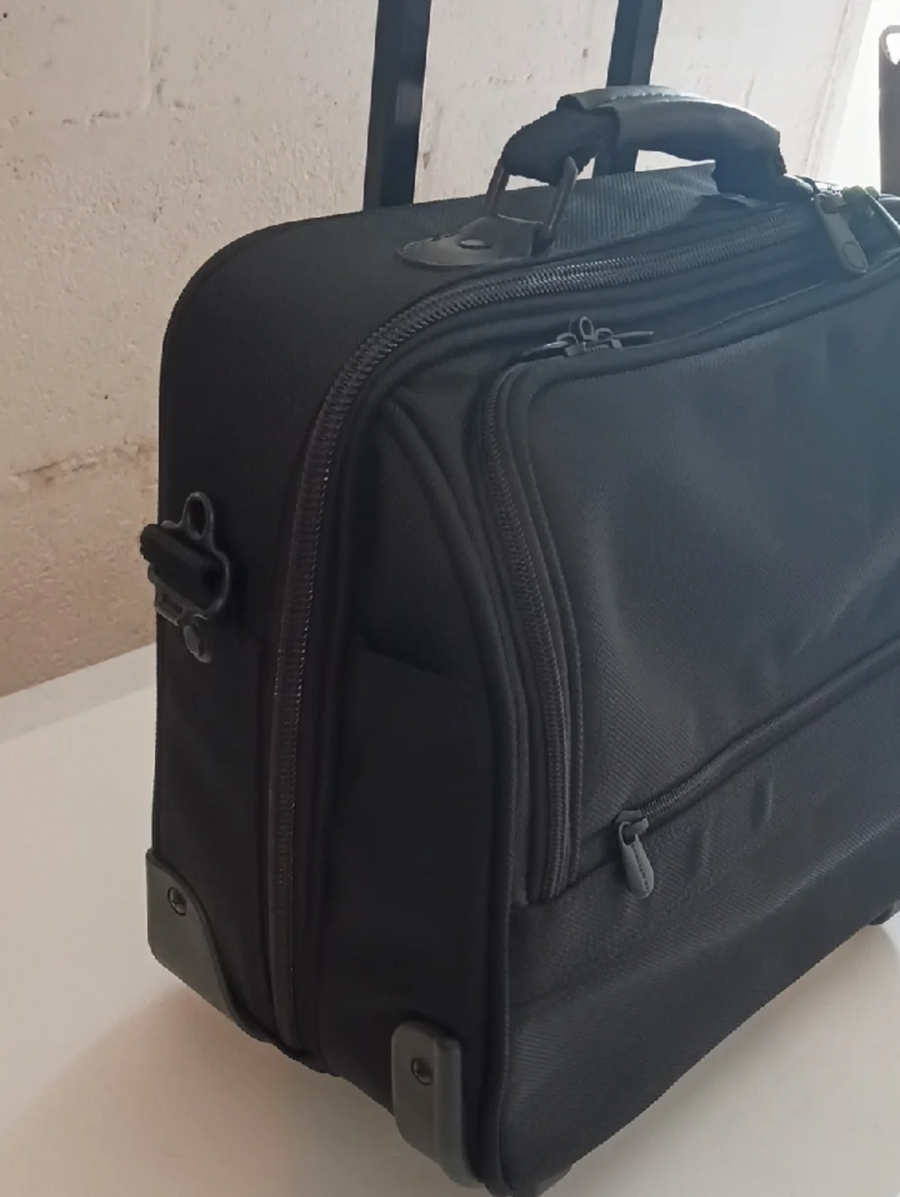 Briggs And Riley black two wheeled under seat cabin bag